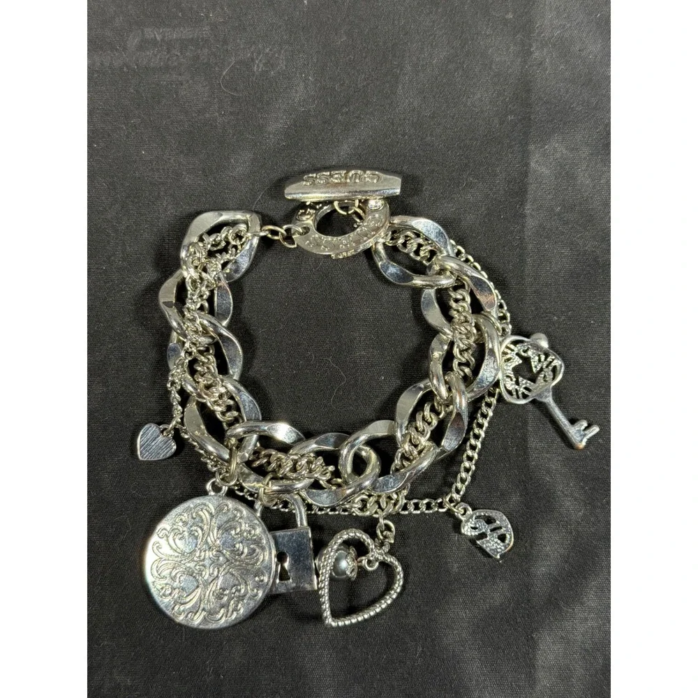 Guess York Silver Tone Multi Strand Charm Bracelet Heart Lock Key Toggle Clasp